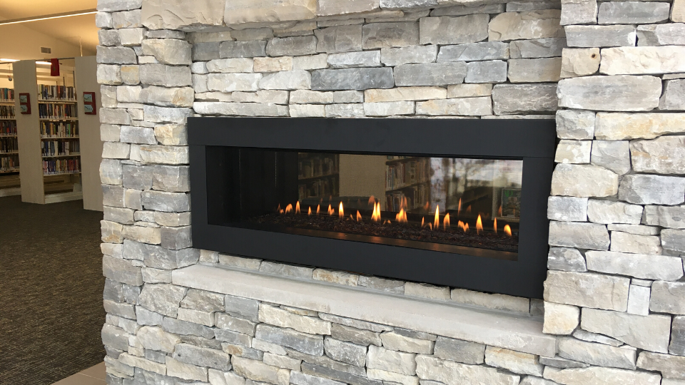 Our unique fireplace offers cozy seating and a place for people to meet, exchange ideas, and read.